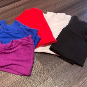 Four faded glory tanks